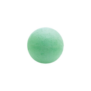 white chocolate ball covered with a thin coat of velvety green pigment.